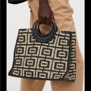 Black and tan raffia bag